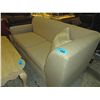 Image 1 : Contemporary light beige sofa with one throw