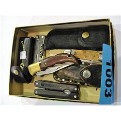 Box of assorted knives; leathermans, lock blade