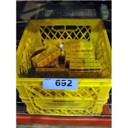 Yellow milk crate filled with bosch spark plugs