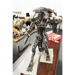 Recycled Metal Art Alien Figure - 23" H x 29" L