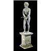 Image 1 : An early 19th century lead figure of a nude boy, in a relaxed pose, holding a small bow and arrow, o