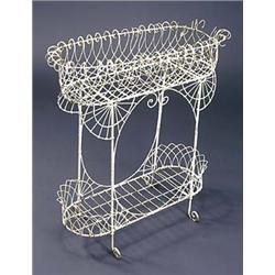 An early 20th century wirework two tier jardiniere stand, of rounded rectangular form, with overscro