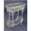Image 1 : An early 20th century wirework two tier jardiniere stand, of rounded rectangular form, with overscro