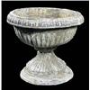 Image 1 : A pair of lead jardinieres, of fluted campana form, with egg and dart everted rim, on rising fluted.