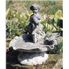 Image 1 : A lead bird bath, in the form of a putto seated in a scallop shell, his finger raised to his lips, w