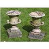 Image 1 : A pair of stoneware two-handled urns, of semi-lobed campana form with everted rim and scrolling lobe