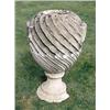 Image 1 : A late 18th century Bath stone vase of spirally fluted form, on a later composition stone circular r