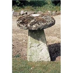 Three sandstone staddle stones of roughly hewn form, with circular caps on square bases, each approx