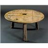 Image 1 : Two oak round tables, the tops constructed from cast iron bound oak cart wheels, on three square tap