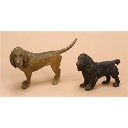 Two Austrian cold painted figures of dogs; one a black spaniel, 7cm high (possibly later painted), t