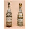 Image 1 : A pair of mid 19th century sand filled glass bottles, with horizontal bands of geometric patterns an