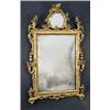 Image 1 : An Italian giltwood mirror in mid 18th century style, the mirrored crest as a cartouche, the frame c