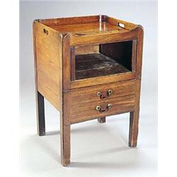 A George III mahogany tray top night commode, with two handles, a tambour front and a pull-out base.