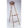 Image 1 : An early 20th century mahogany easel, the pediment centred with a patera above a fluted frieze, the.