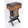Image 1 : A mid 19th century Oriental tortoiseshell and lacquered work table, decorated overall with landscape