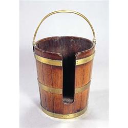 A George III mahogany and brass bound plate bucket with a hinged handle and a slit to the front, 44.