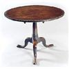 Image 1 : A George III mahogany tilt top table, the round dished top on a turned column and tripod base with p