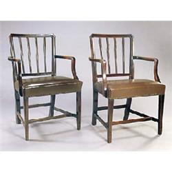 A pair of George III mahogany elbow chairs, each rectangular back with canted corners and uprights,.