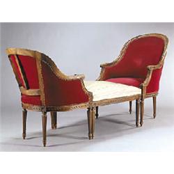 A beech duchesse brisee comprising a large armchair, a small armchair and a pouffe, the frames carve