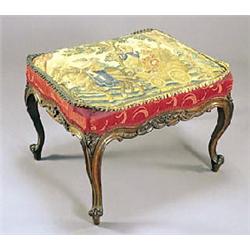 A late Victorian rosewood rectangular stool, the seat upholstered with an 18th century woolwork pane