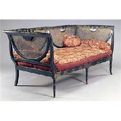An early 20th century black japanned sofa, painted with figures in Oriental landscapes, the sides wi