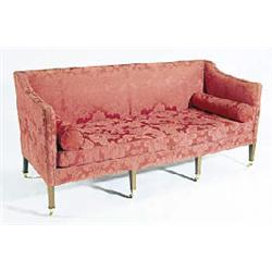 A sofa in George III style, the back, sides and seat with deep red damask upholstery on mahogany squ