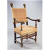 Image 1 : A pair of Italian walnut elbow chairs of large proportions, each with giltwood scroll carved finials