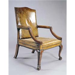 A mahogany Gainsborough chair in George III style, with a rectangular upholstered back, seat and arm