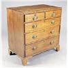 Image 1 : An early 19th century mahogany chest, the crossbanded flush top above two short and three long gradu