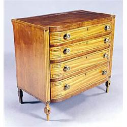 An early 19th century mahogany and satinwood bowfronted chest with ebony stringing, the mahogany sat