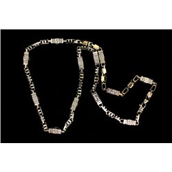 CHAIN:  [1] 10k WG fancy link chain; 33"s; 174.5 grams  (This is a 9" bracelet attached by a clasp t