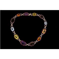 NECKLACE: (1) Diamond and multi-colored gemstone 18k WG necklace 16  long, set with (2) cushion shap