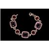 Image 1 : BRACELET: (1) Pink tourmaline and amethyst, diamond bracelet in 18k WG 7 1/4" long with (3) 14 x 16m