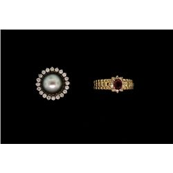 RING: (1) Ladies 14ky band, prong set in the center with (1) oval faceted ruby 4.7 x 3.8mm approx. 0