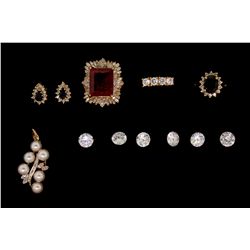 RING: (1) Ladies synthetic ruby and diamond 14ky ring. Center rectangular step cut ruby 13.8 x 11.1m