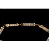 Image 3 : BRACELET: (1) 14kW and YG link bracelet 7" long. Set with (40) approx.  0.01ct. rbc diamonds, color 