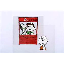 A Peanuts animation cell depicting Lucy as "The Doctor", with Lucy and Snoopy in the doctor's booth.