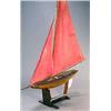Image 1 : A large A-class pond yacht, circa 1920-30, of wooden plank-on-frame construction with plain varnish.