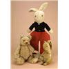 Image 1 : A teddy bear and two rabbits: comprising a 1920s teddy with fully-jointed golden plush body and blac