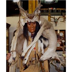 Native American Figure with Deer