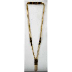 1800's Greesey Yellow Swastica Necklace