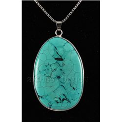 102.21CTW BIG SLICE TURQUOISE IN SILVER BEZEL PENDANT