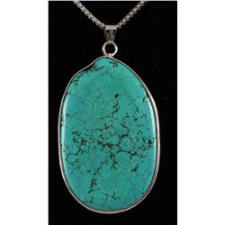 79.00CTW BIG SLICE TURQUOISE IN SILVER BEZEL PENDANT