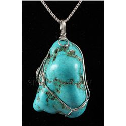 NATURAL 262.40CTW TURQUOISE WIRE WRAPPED PENDANT