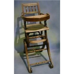 A childs Edwardian beechwood metamorphic high chair with bobbin turned decoration