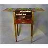 Image 1 : An Edwardian inlaid mahogany work table with well fitted interior and flap to the front, inlaid