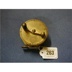 A 19th/20th Century brass fishing reel with ram/goat mark to the side 3 