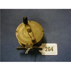 An Alcocks 19th/20th Century brass fishing reel 3"