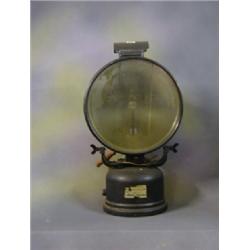 A large pair of Tilley flood light projector lamps