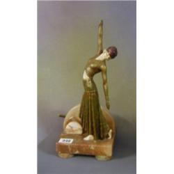 An Art Deco spelter and "ivory" table lamp of a dancing girl 12"